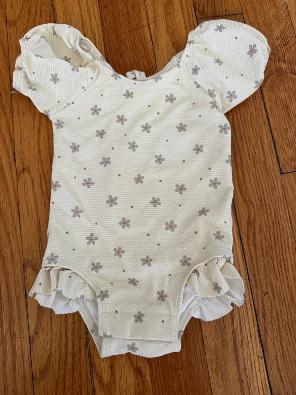 Quincy Mae baby girl cream floral puff sleeve one piece swimsuit Ruffle leg 3-6